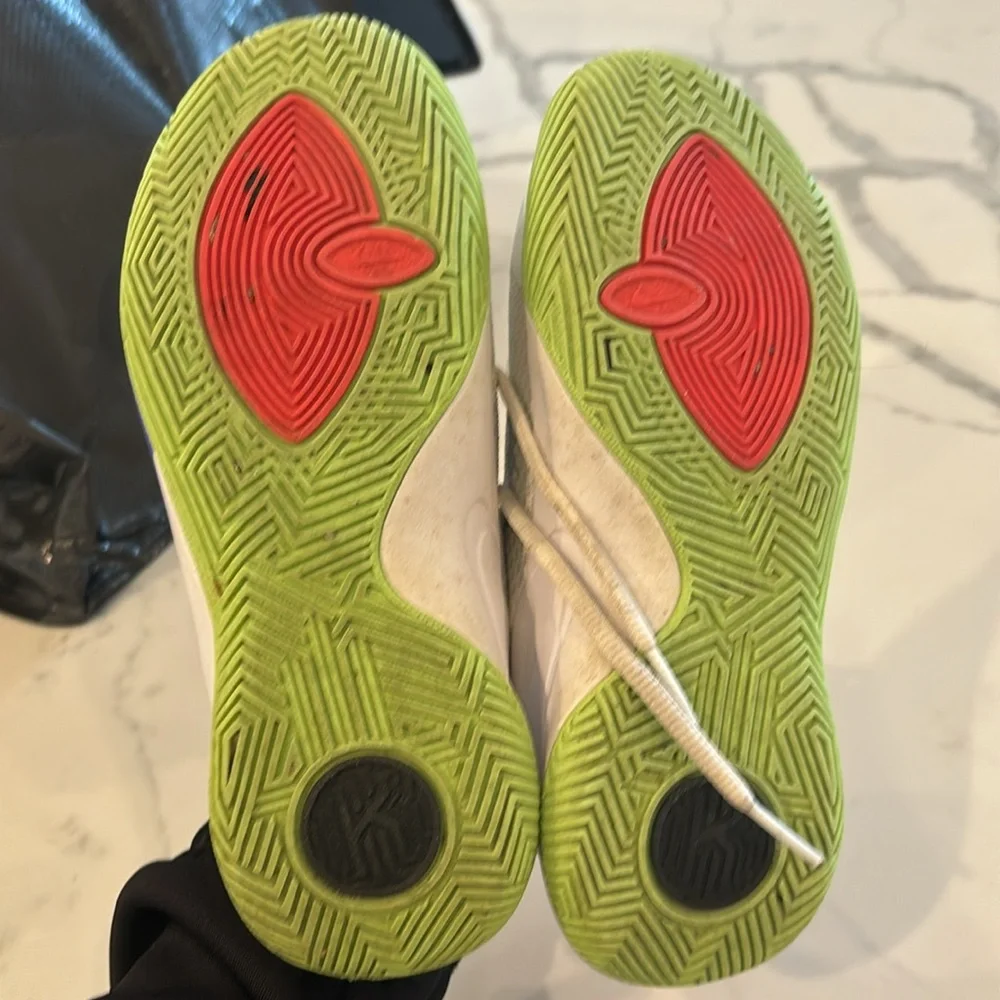 Gently used Nike Kyrie boys sneakers white black lime green and purple size 2.5